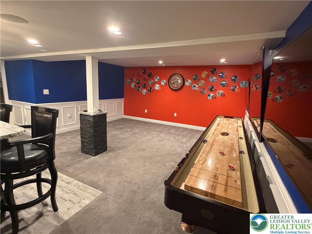 4157 Walter Road Bethlehem, PA 18020 - Photo 30 of 36 Entertain in style within this generously sized recreation room, perfect for social gatherings.