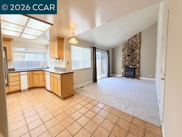2321 Talavera Drive San Ramon, CA 94583 - Photo 15 of 50 a view of a kitchen with kitchen island and natural light