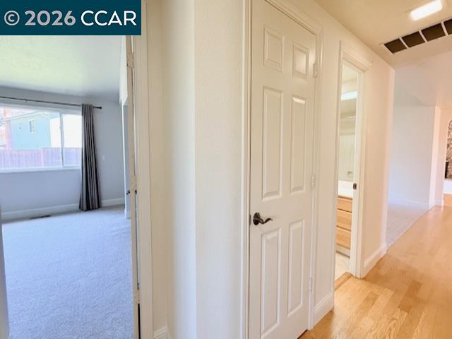 2321 Talavera Drive San Ramon, CA 94583 - Photo 25 of 50 a view of a hallway with wooden floor and entryway