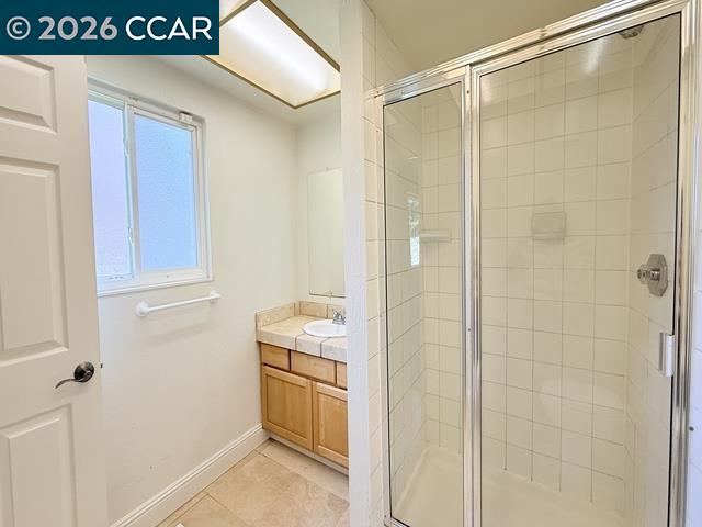 2321 Talavera Drive San Ramon, CA 94583 - Photo 30 of 50 a bathroom with a shower and a sink