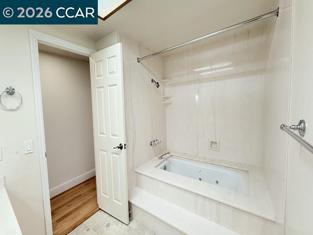 2321 Talavera Drive San Ramon, CA 94583 - Photo 35 of 50 a bathroom with a bathtub and a shower