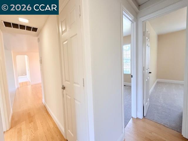 2321 Talavera Drive San Ramon, CA 94583 - Photo 39 of 50 a view of a hallway with wooden floor
