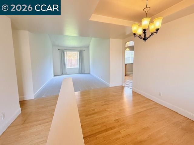 2321 Talavera Drive San Ramon, CA 94583 - Photo 7 of 50 a view of a hallway with wooden floor