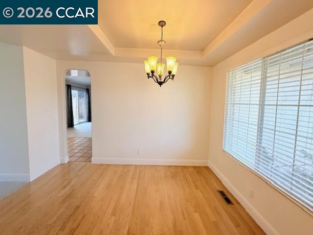2321 Talavera Drive San Ramon, CA 94583 - Photo 8 of 50 a view of a room with wooden floor and chandelier