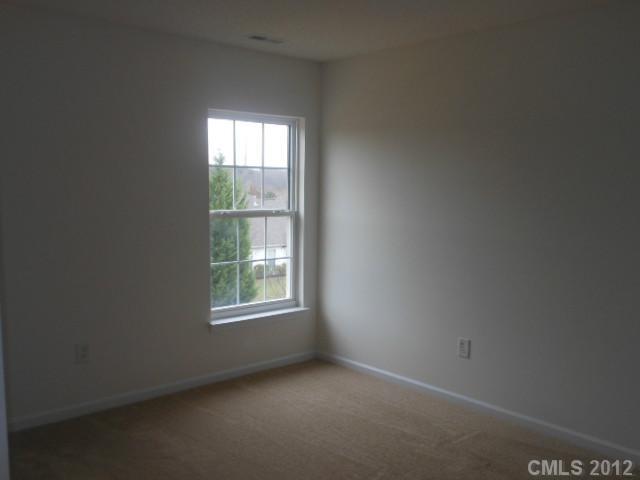 13502 Latta Gordon Road Huntersville, NC 28078 - Photo 6 of 7 an empty room with a window