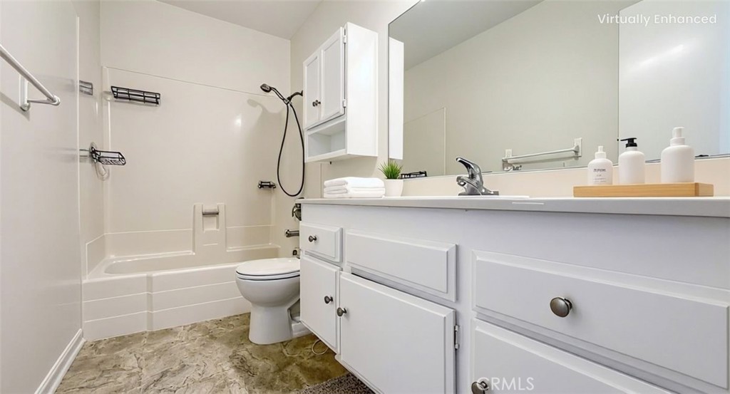 530 Spruce Way La Habra, CA 90631 - Photo 16 of 29 a bathroom with a sink a toilet and shower