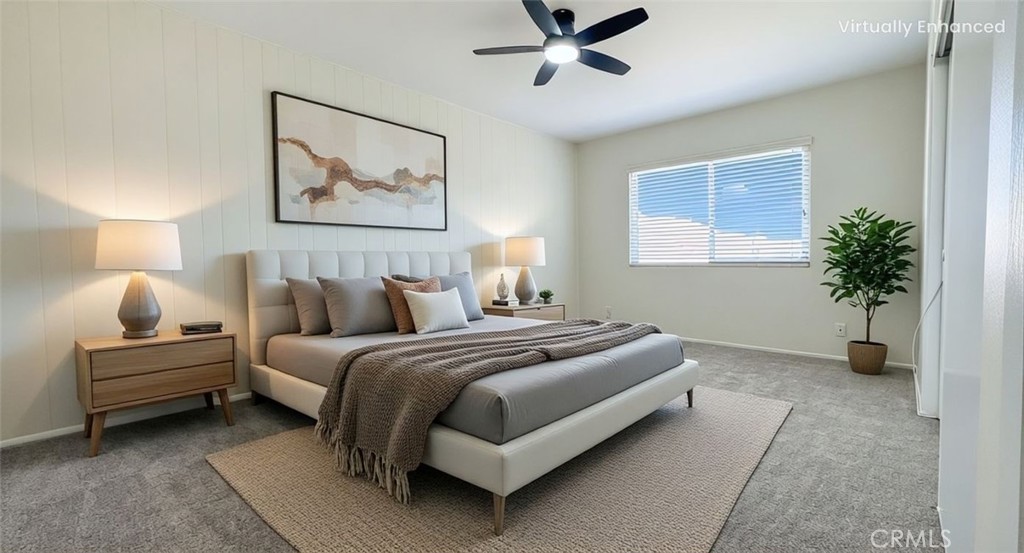 530 Spruce Way La Habra, CA 90631 - Photo 17 of 29 a bedroom with a bed lamp and a potted plant