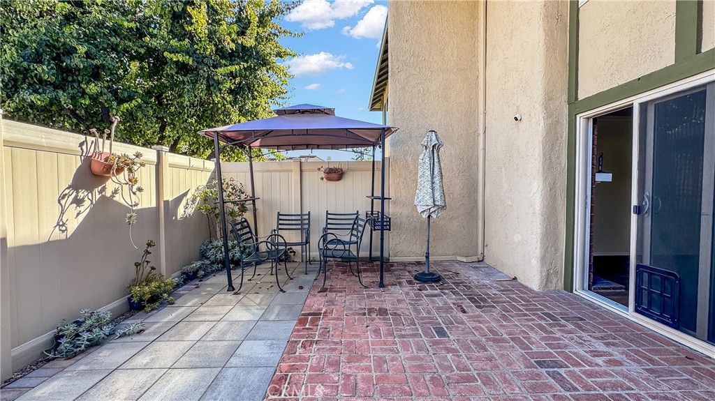 530 Spruce Way La Habra, CA 90631 - Photo 20 of 29 a backyard of a house with table and chairs