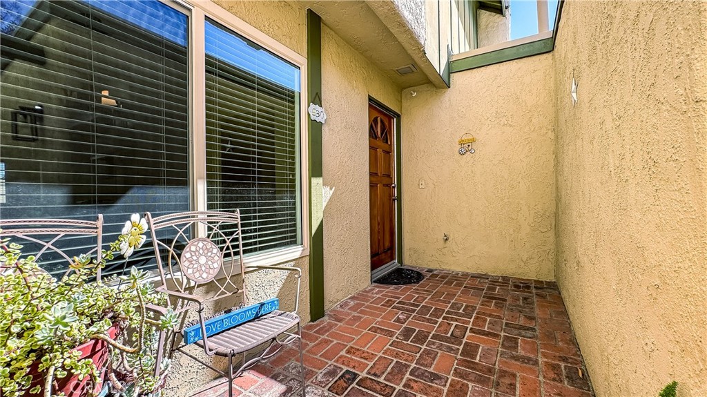 530 Spruce Way La Habra, CA 90631 - Photo 3 of 29 a view of a door and chair in the balcony