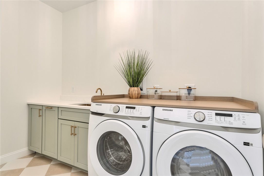 63 Forrest Lane Charlestown, RI 02813 - Photo 29 of 47 Laundry with sink and storage.