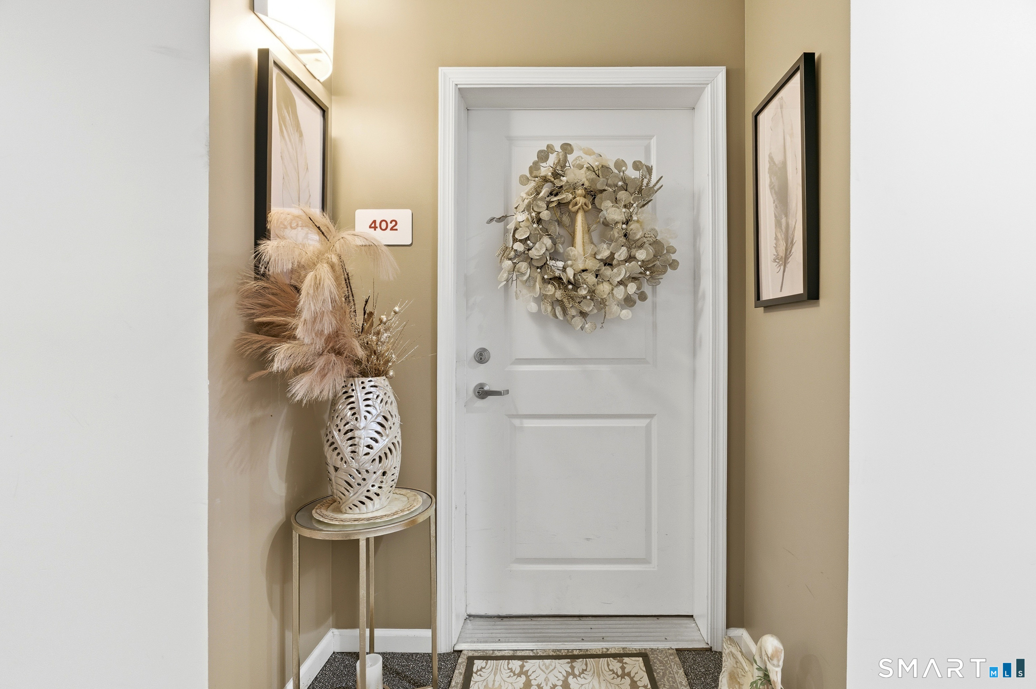 400 Bank Street, Unit 402 New London, CT 06320 - Photo 2 of 35 a bathroom with a door and a shower