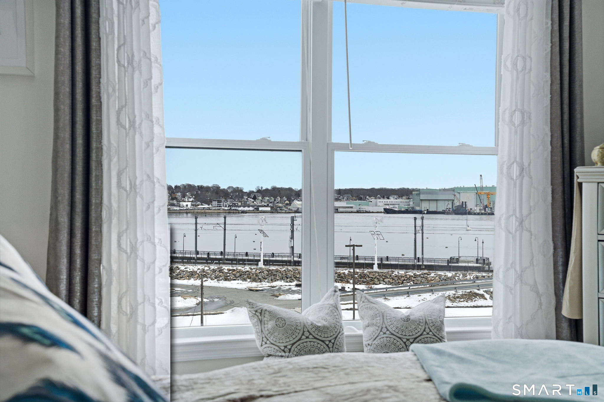 400 Bank Street, Unit 402 New London, CT 06320 - Photo 22 of 35 a very nice looking room with a floor to ceiling window and an outdoor view
