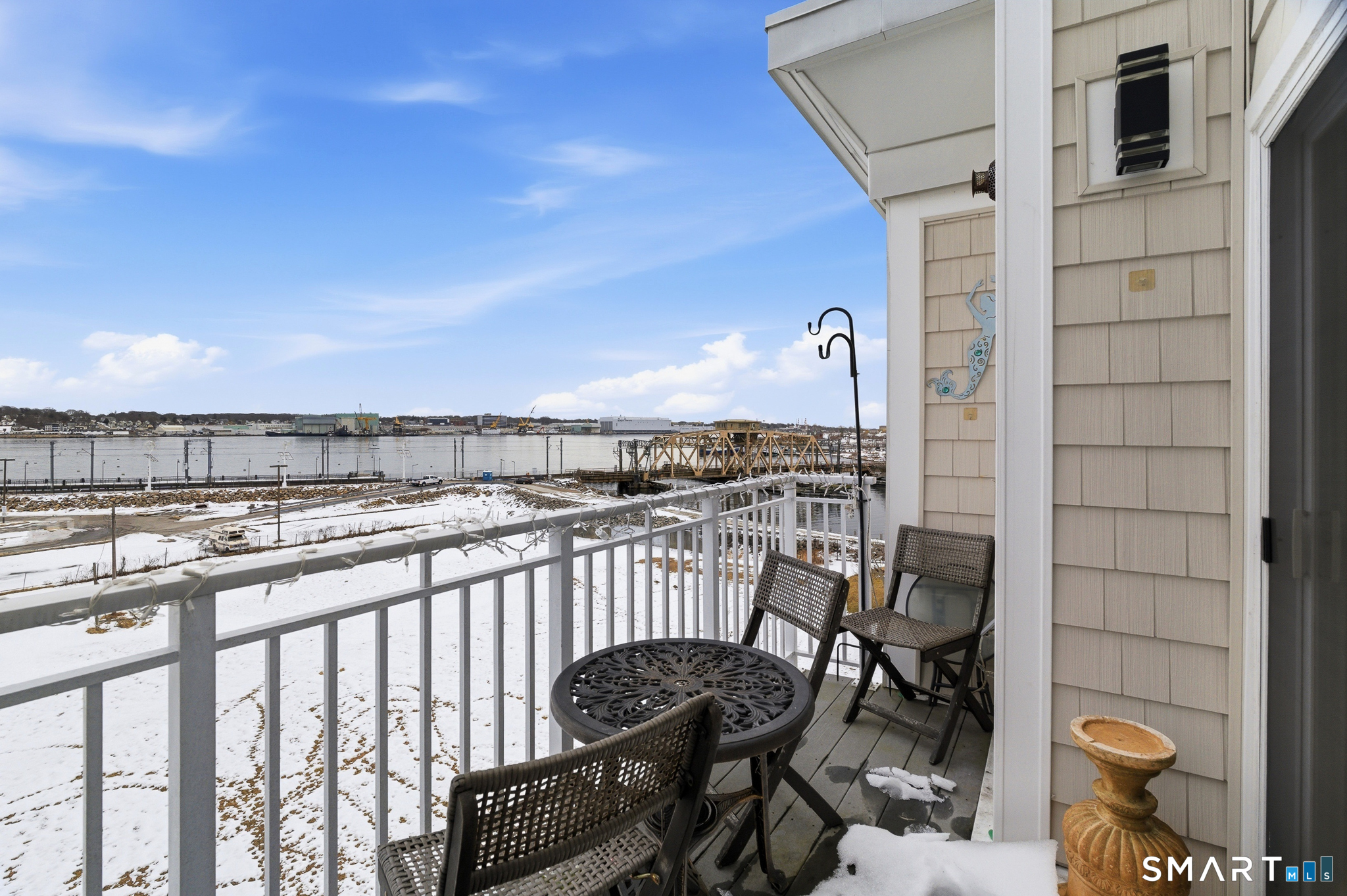 400 Bank Street, Unit 402 New London, CT 06320 - Photo 25 of 35 a view of a balcony with chairs