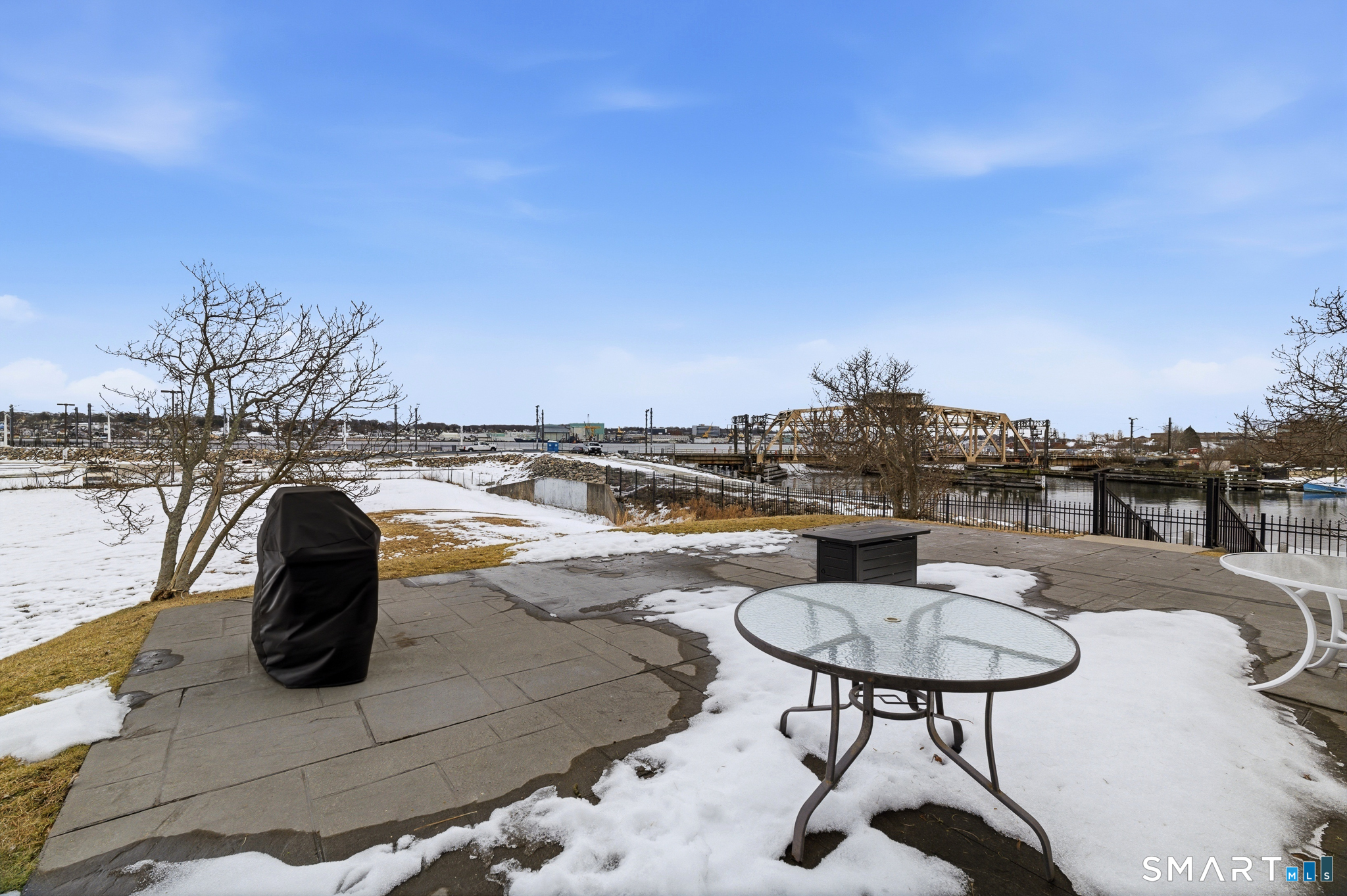 400 Bank Street, Unit 402 New London, CT 06320 - Photo 26 of 35 a view of a terrace with furniture and stove
