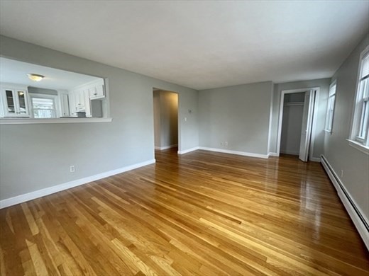 59 Desoto Road, Unit 2 Boston, MA 02132 - Photo 4 of 13 a view of empty room with wooden floor