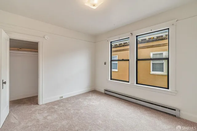 an empty room with closet