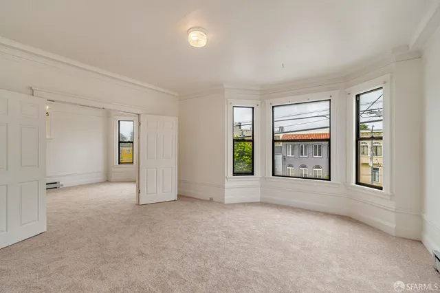 an empty room with windows