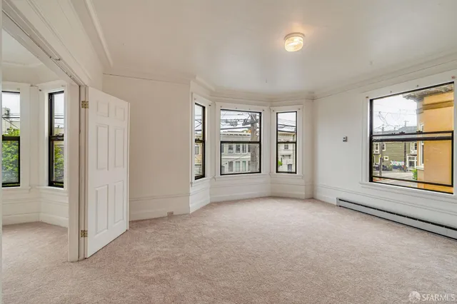 a kitchen with stainless steel appliances a refrigerator and a sink