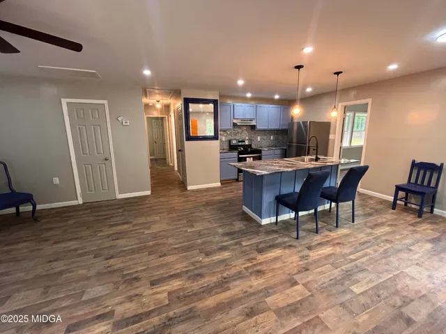 a view of a dining room with furniture