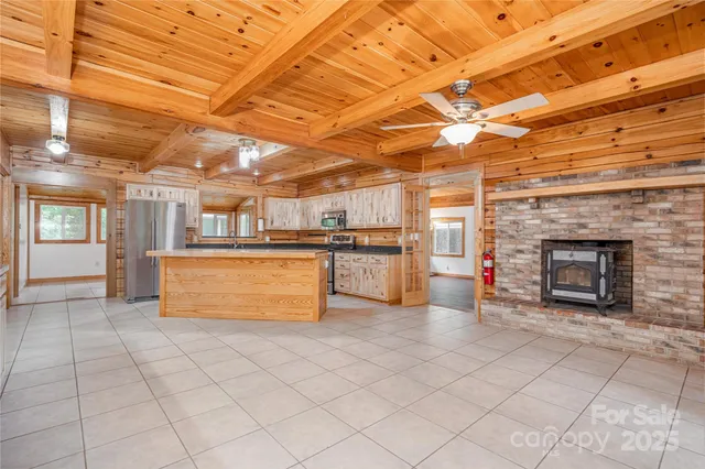 a view of swimming pool with wooden floor and roof
