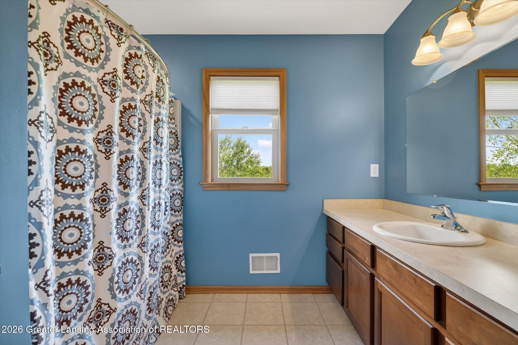 1300 East Round Lake Road Dewitt, MI 48820 - Photo 26 of 59 28-1300-E-Round-Lake-Rd-WindowStill-Phot
