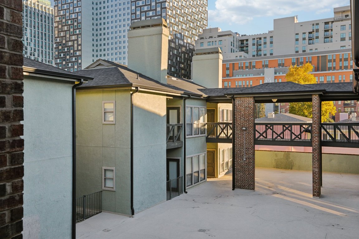 807 West 25th Street, Unit 302 Austin, TX 78705 - Photo 16 of 18 View of patio featuring a view of city