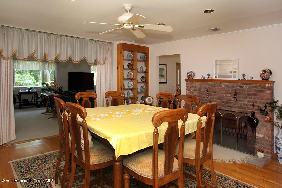 300 Merrick Road Farmingdale, NJ 07727 - Photo 6 of 27 a view of a dining room with furniture window and outside view
