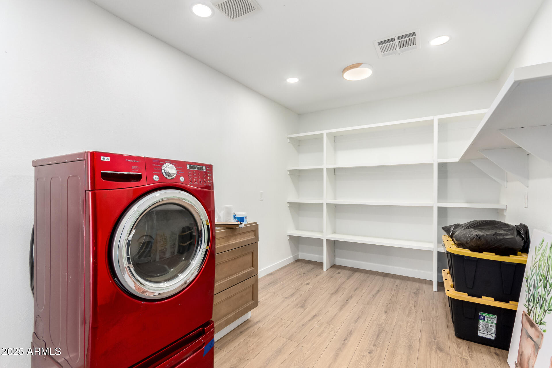 5237 East Dallas Street Mesa, AZ 85205 - Photo 19 of 30 a room with a walk in closet and a window