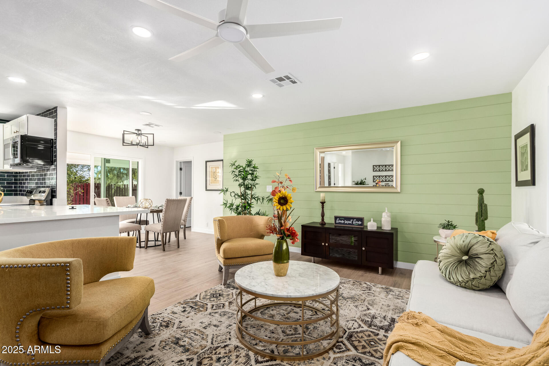 5237 East Dallas Street Mesa, AZ 85205 - Photo 4 of 30 a bedroom with furniture and a large window