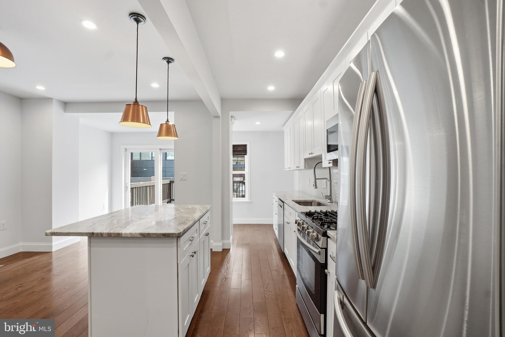 1118 Chicago Street Southeast Washington, DC 20020 - Photo 5 of 27 Modern kitchen with sleek finishes.