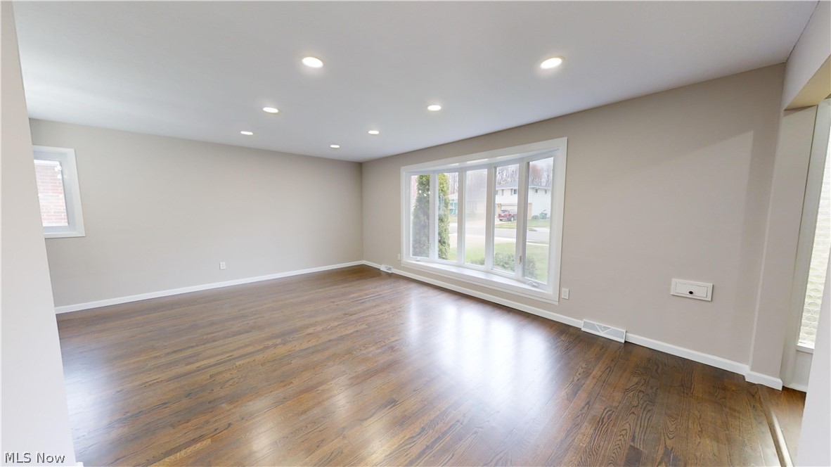 1224 Cordova Road Mayfield Heights, OH 44124 - Photo 6 of 29 Spare room with dark hardwood / wood-style flooring