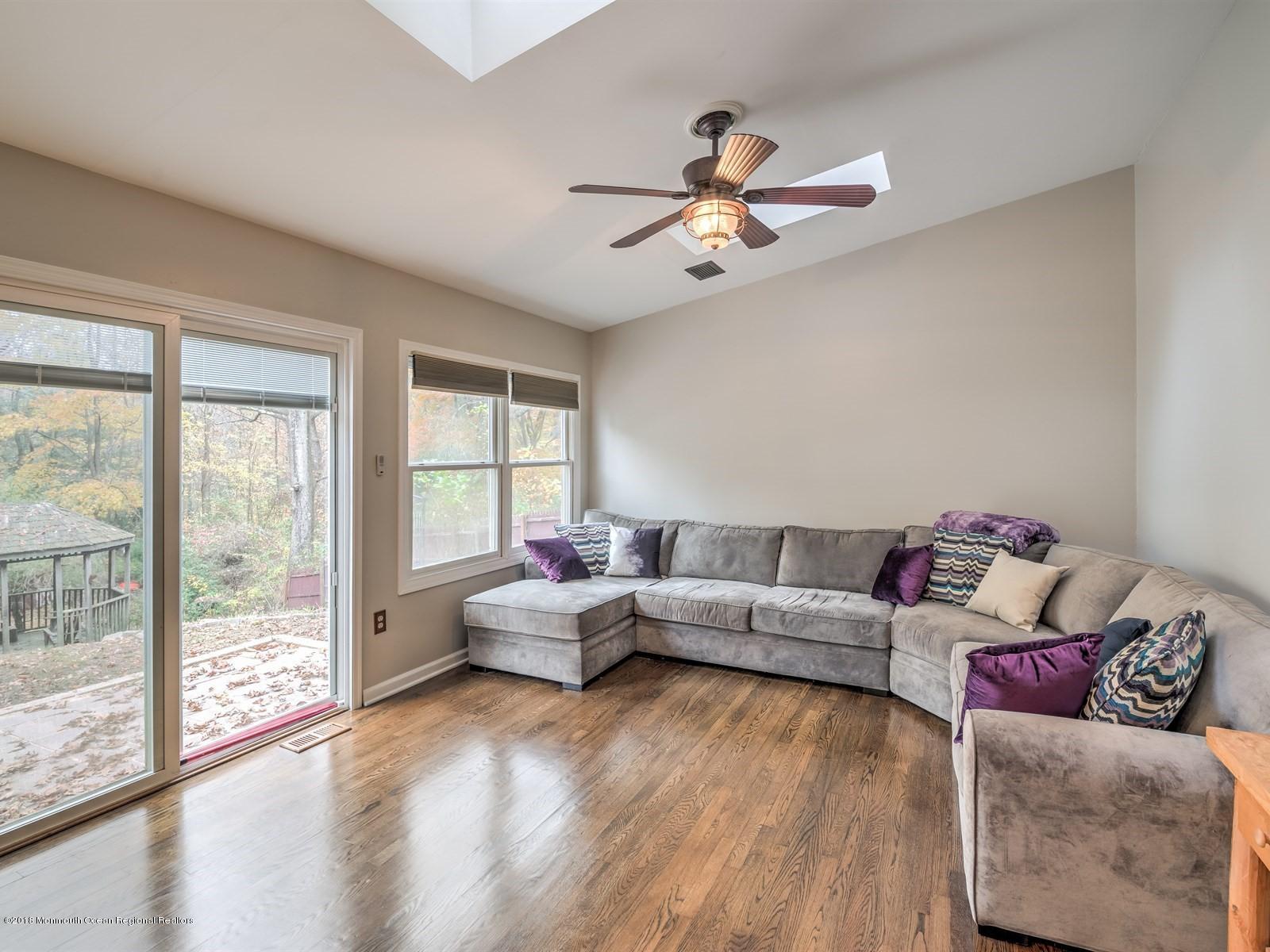 65 Streeker Road Wrightstown, NJ 08562 - Photo 12 of 34 a living room with furniture and a large window