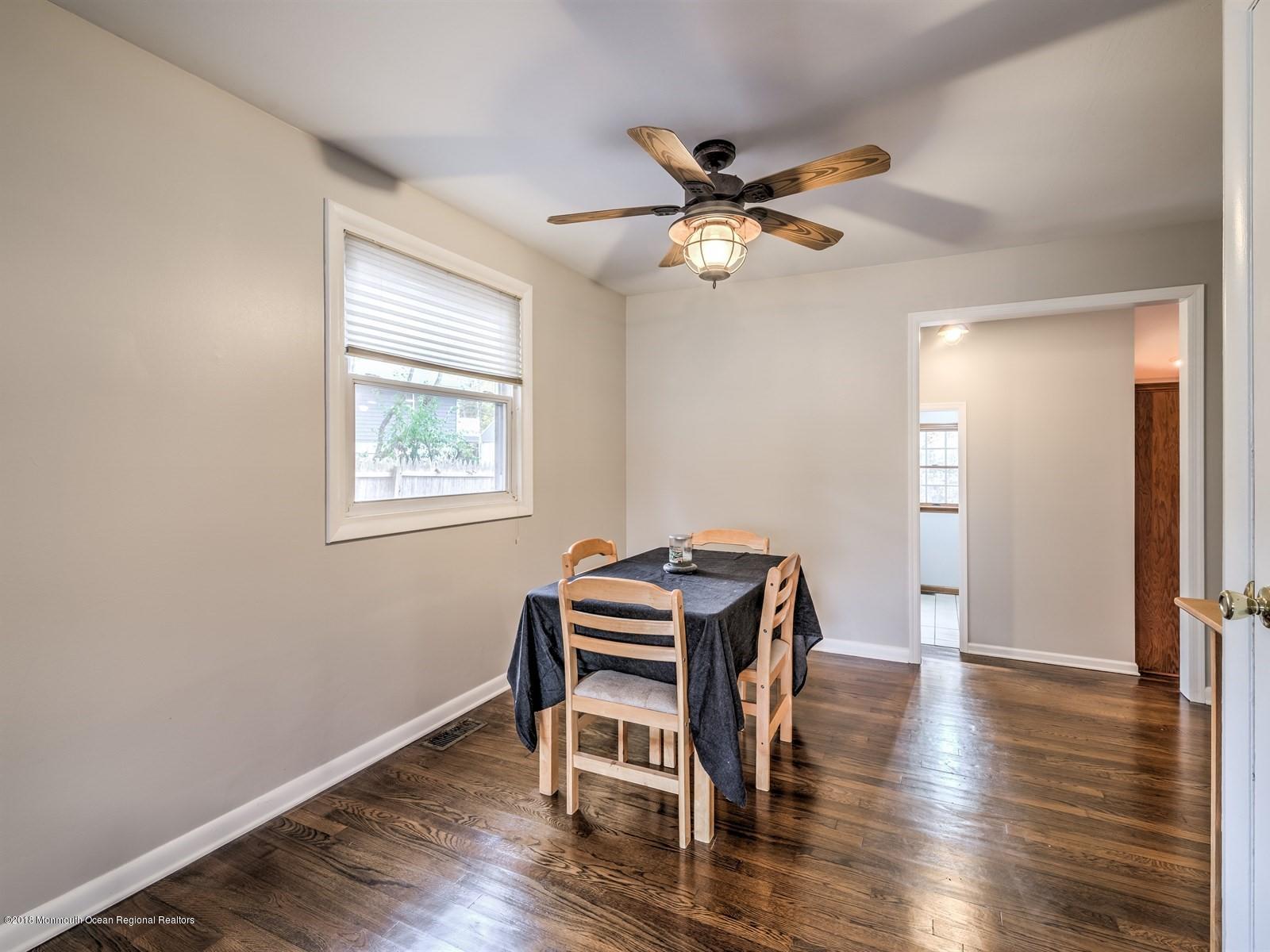65 Streeker Road Wrightstown, NJ 08562 - Photo 16 of 34 a view of a workspace with wooden floor and a window