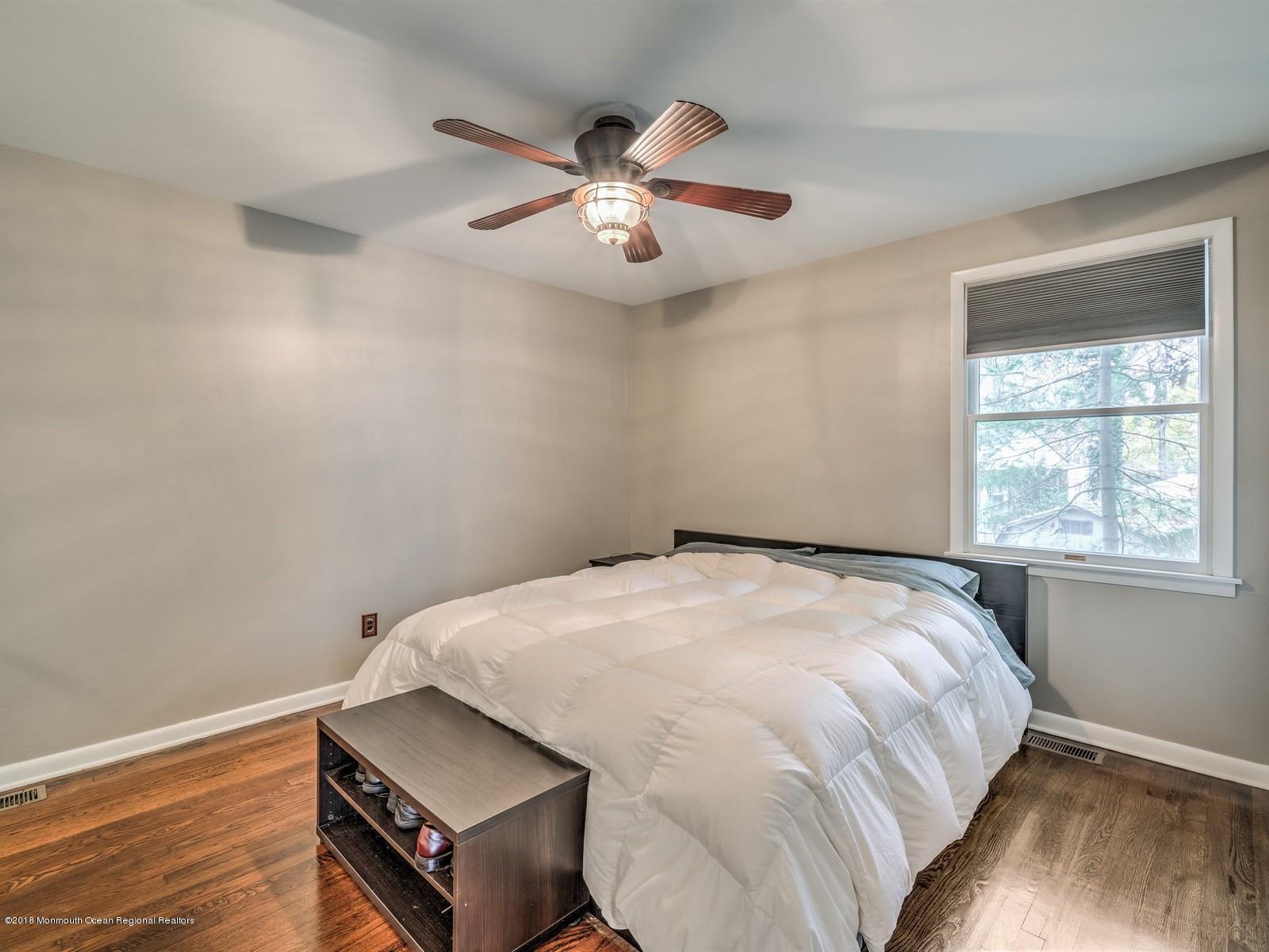 65 Streeker Road Wrightstown, NJ 08562 - Photo 18 of 34 a bedroom with a bed and a window