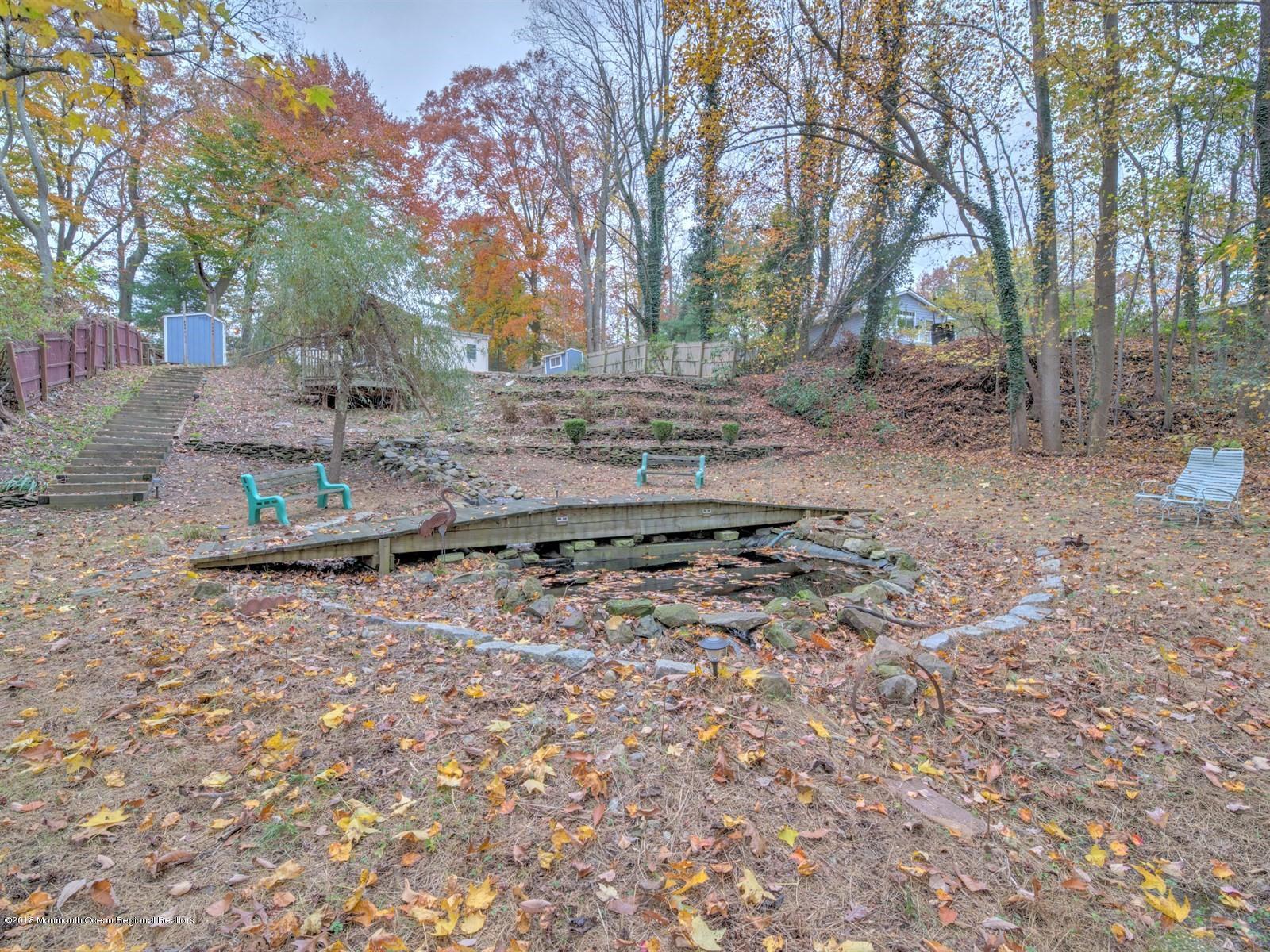65 Streeker Road Wrightstown, NJ 08562 - Photo 28 of 34 a view of a backyard with large trees