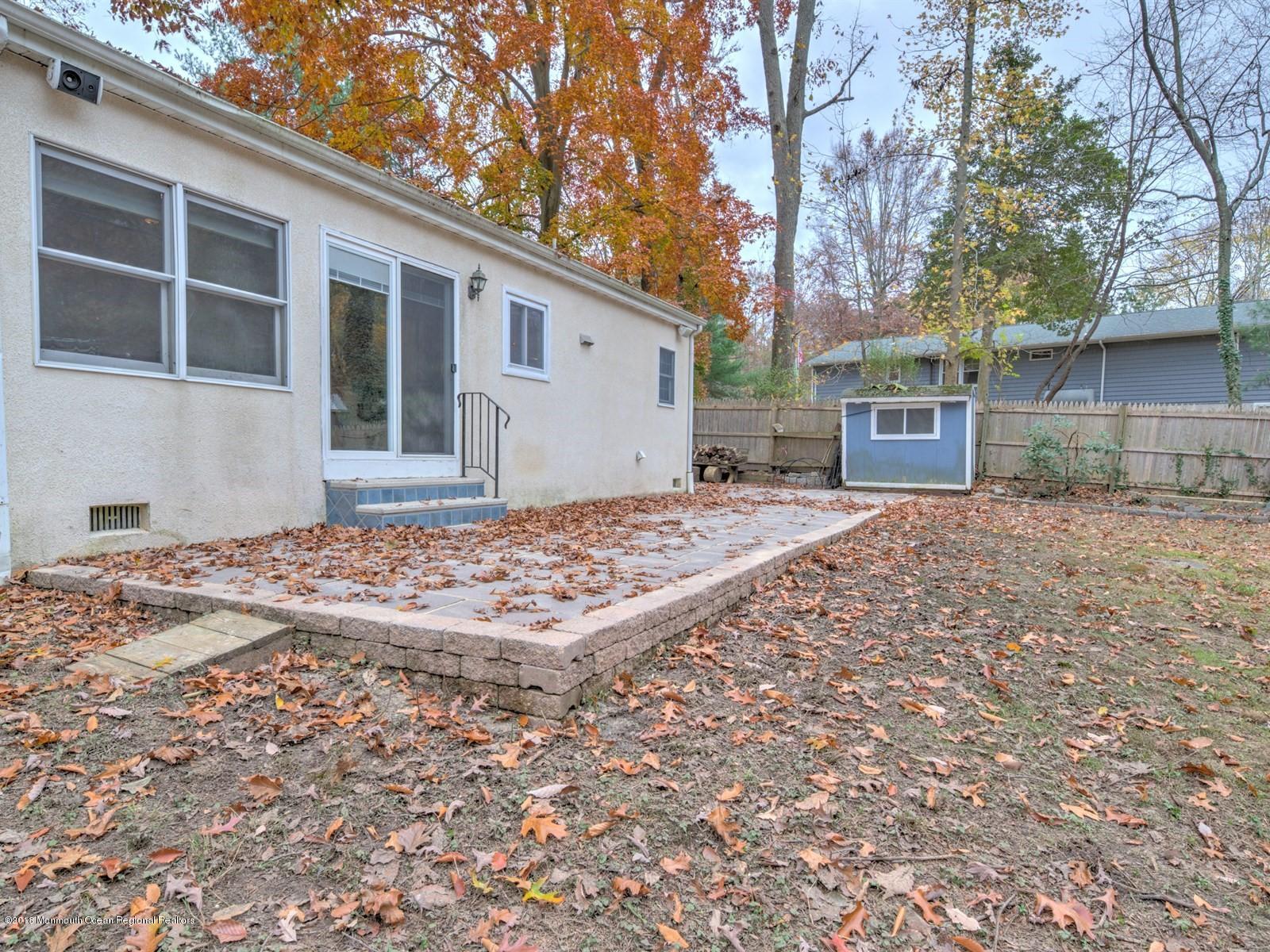 65 Streeker Road Wrightstown, NJ 08562 - Photo 32 of 34 a front view of a house with a yard