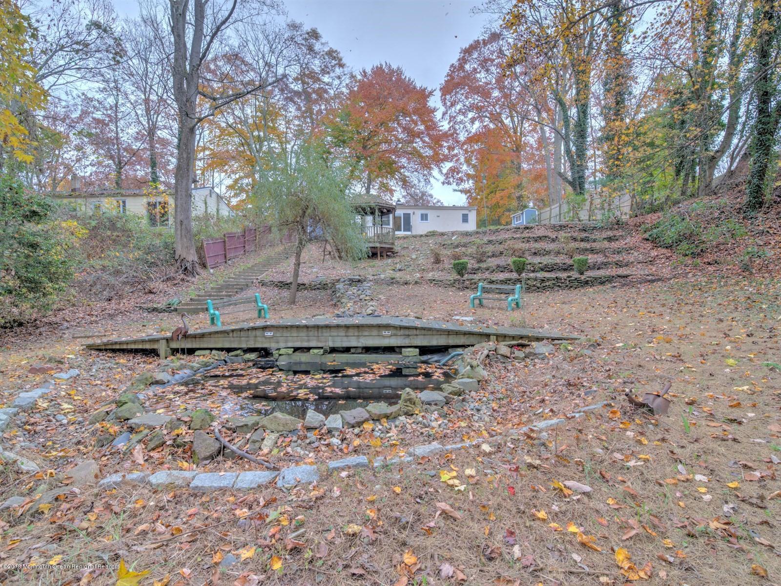 65 Streeker Road Wrightstown, NJ 08562 - Photo 5 of 34 a view of a yard with trees