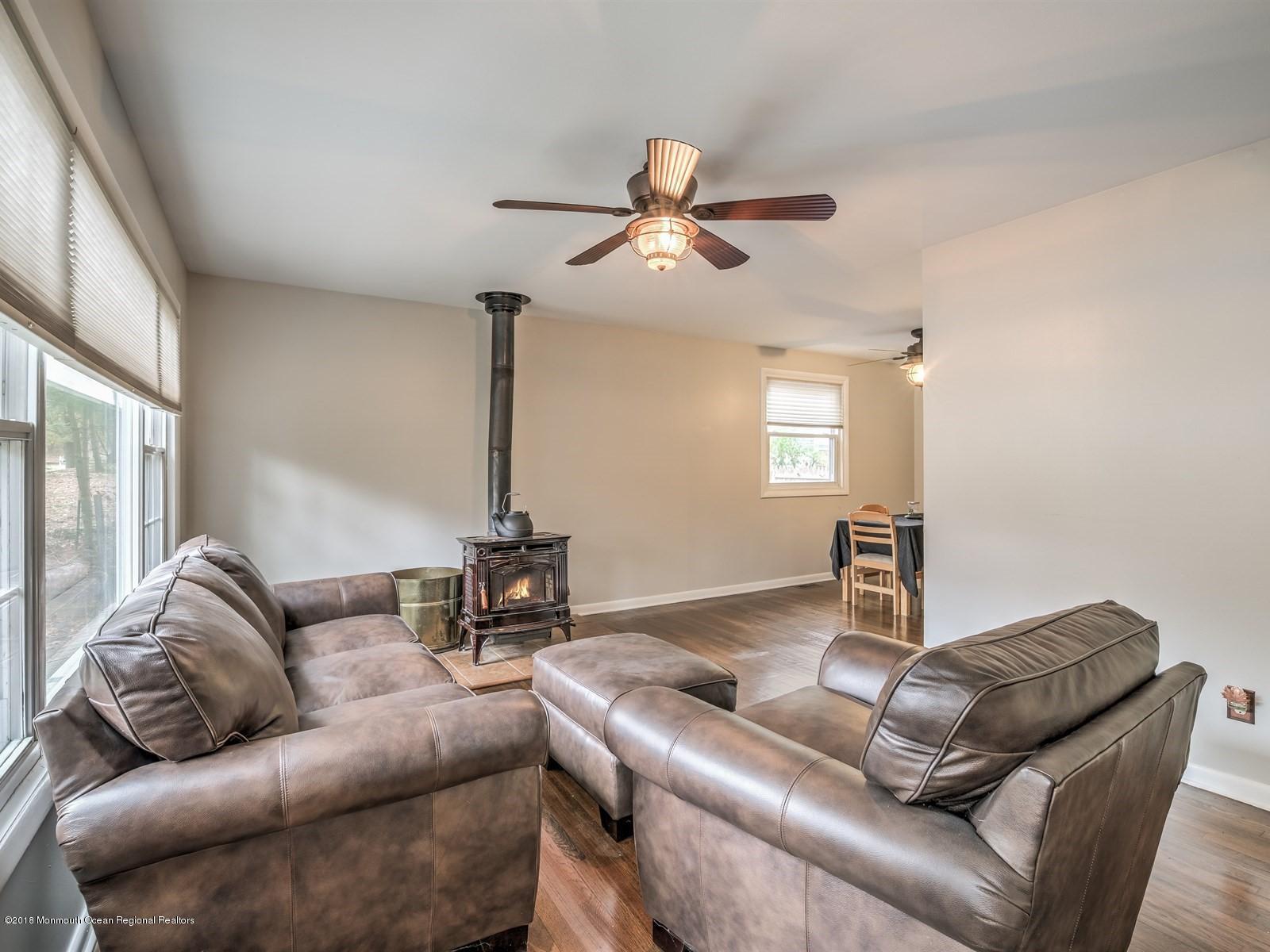 65 Streeker Road Wrightstown, NJ 08562 - Photo 8 of 34 a living room with furniture