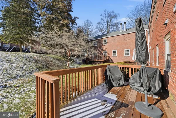a view of balcony with furniture