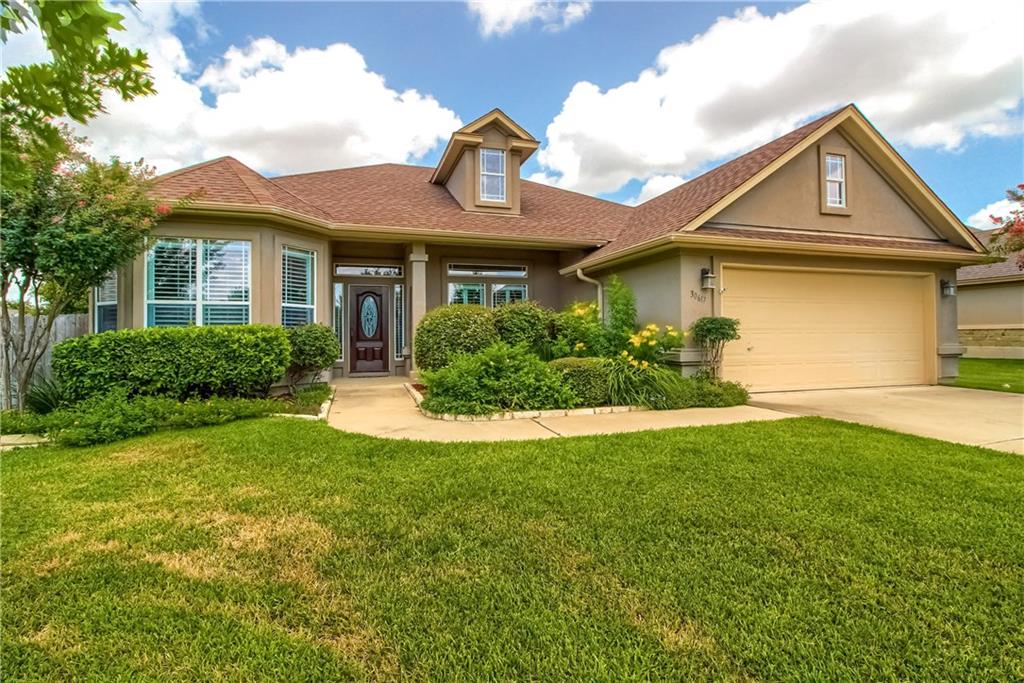 30617 Chi Chi Drive Georgetown, TX 78628 - Photo 1 of 1 a front view of a house with a yard