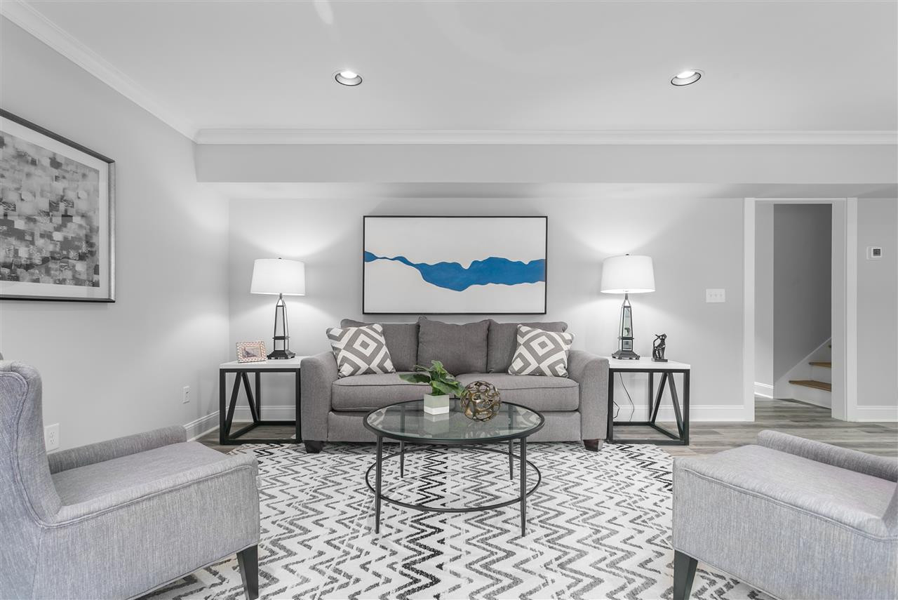 2209 Nancy Ann Drive Raleigh, NC 27607 - Photo 22 of 30 Located on the lower level, the large living room offers flexibility. Living Room