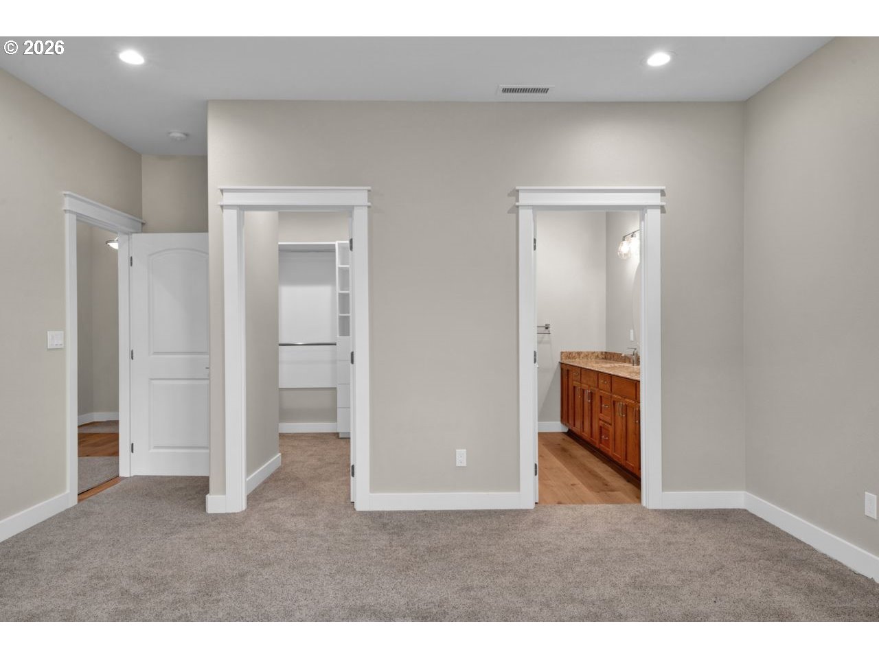 4080 Caddington Lane Florence, OR 97439 - Photo 24 of 48 a living room with a hallway and a refrigerator