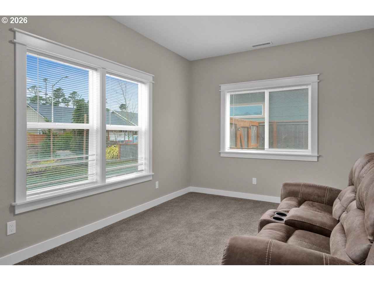 4080 Caddington Lane Florence, OR 97439 - Photo 29 of 48 a living room with furniture and a window