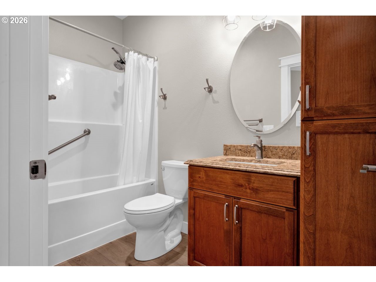 4080 Caddington Lane Florence, OR 97439 - Photo 36 of 48 a bathroom with a granite countertop sink toilet and shower