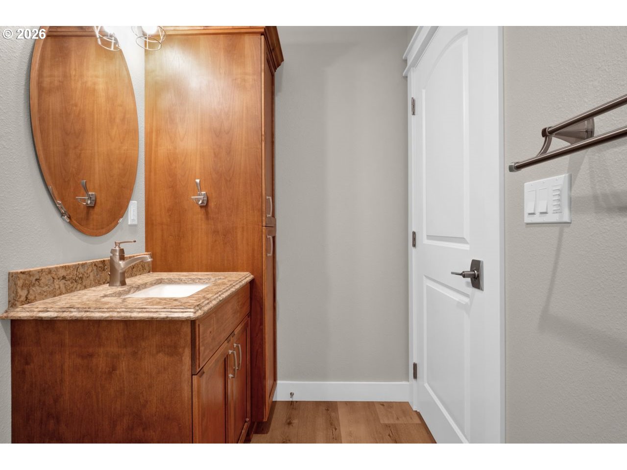 4080 Caddington Lane Florence, OR 97439 - Photo 37 of 48 a bathroom with a sink vanity and a mirror