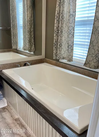 a view of a bathtub in a balcony