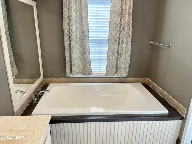 a close up of a bathtub