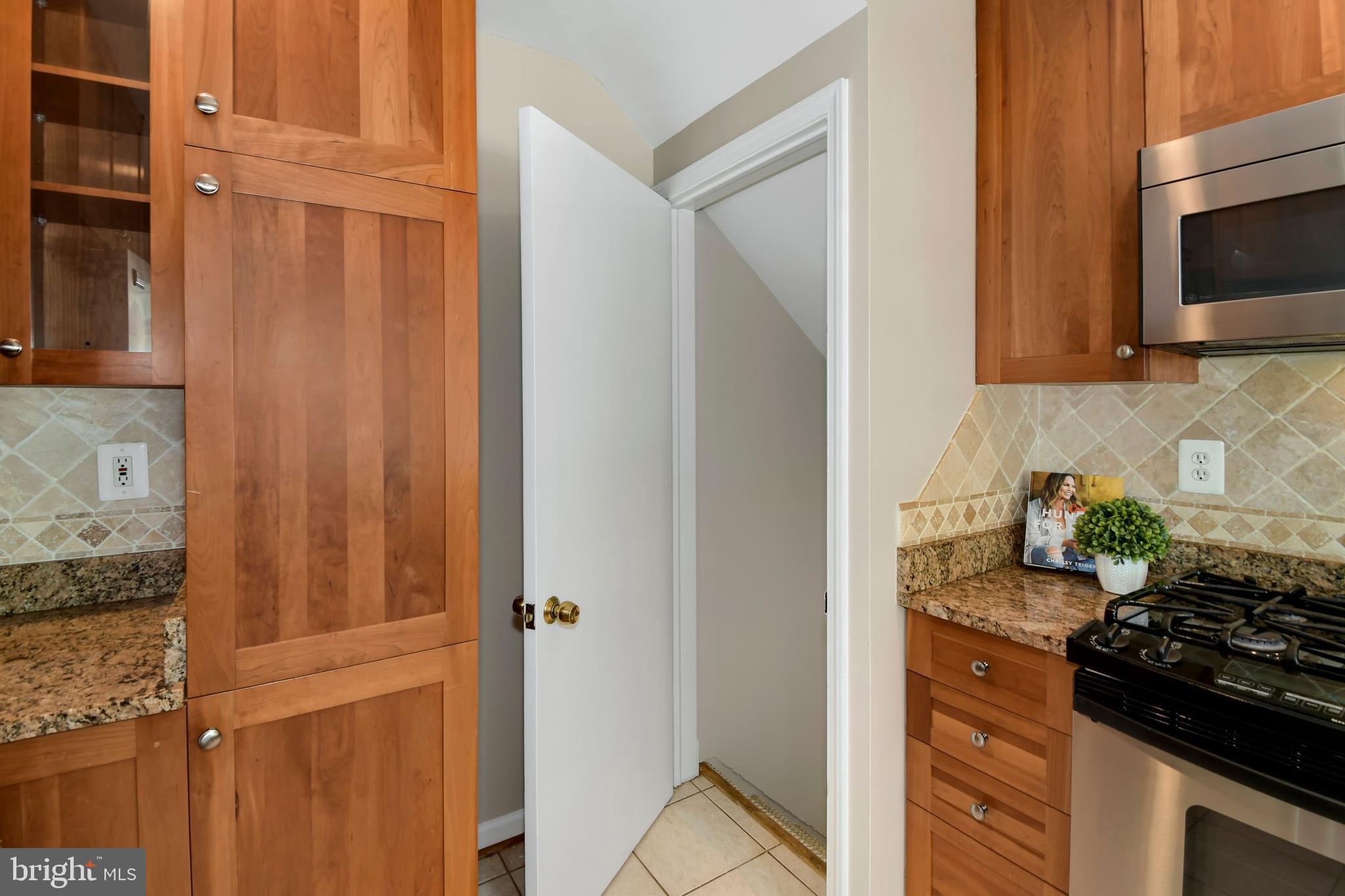6105 Brandon Avenue Springfield, VA 22150 - Photo 12 of 45 Granite counters & custom backsplash