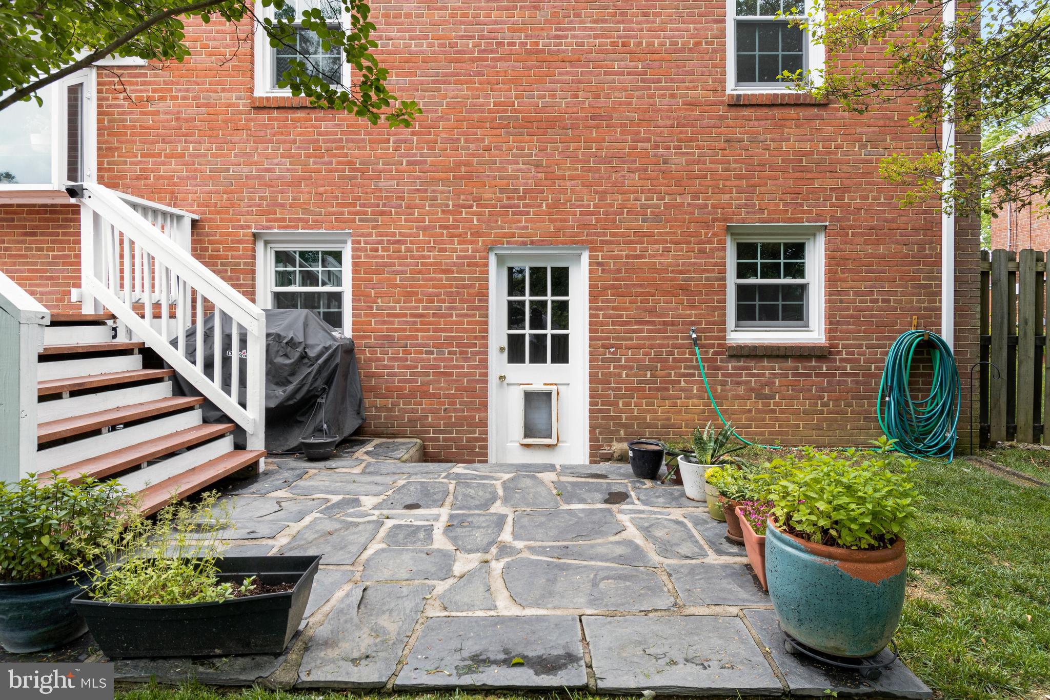 6105 Brandon Avenue Springfield, VA 22150 - Photo 25 of 45 Slate patio is a great place for a firepit