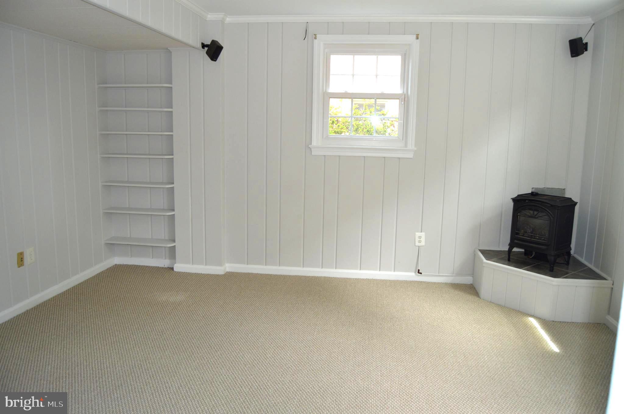6105 Brandon Avenue Springfield, VA 22150 - Photo 27 of 45 Lower level recreation room with fire place